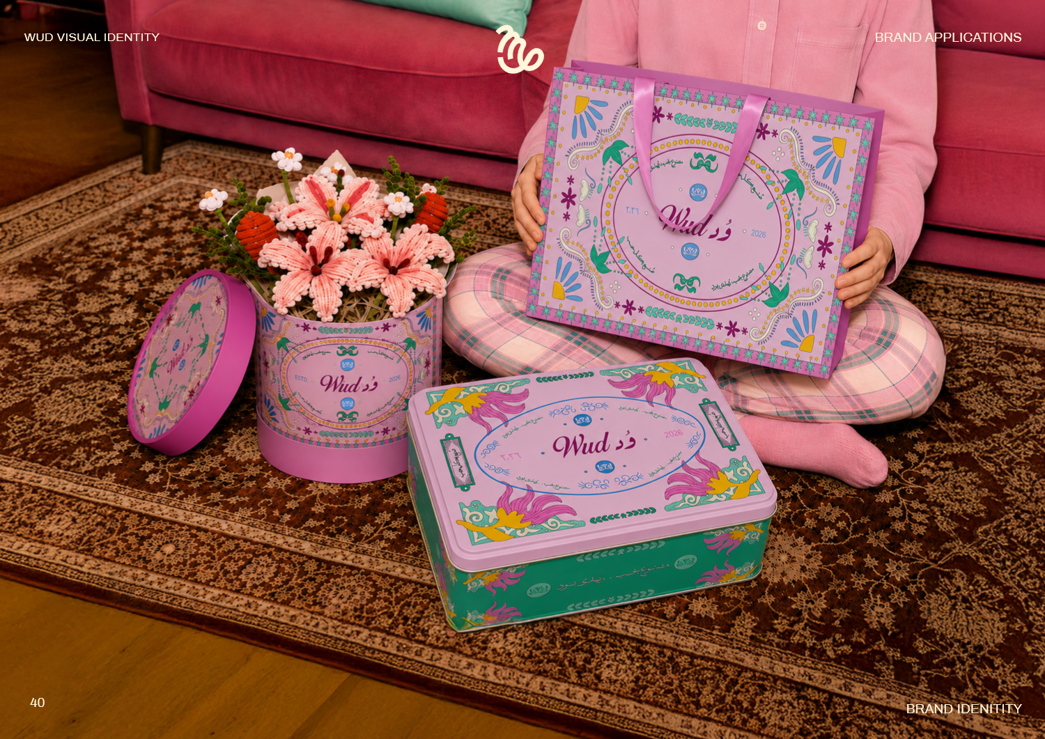 Model holding WUD flower boxes and tote bag