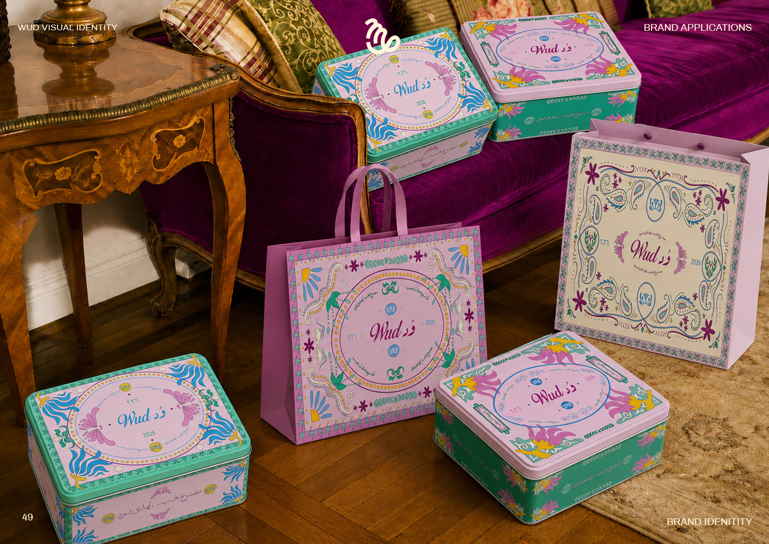 Suite of tin boxes and packaging on velvet sofa